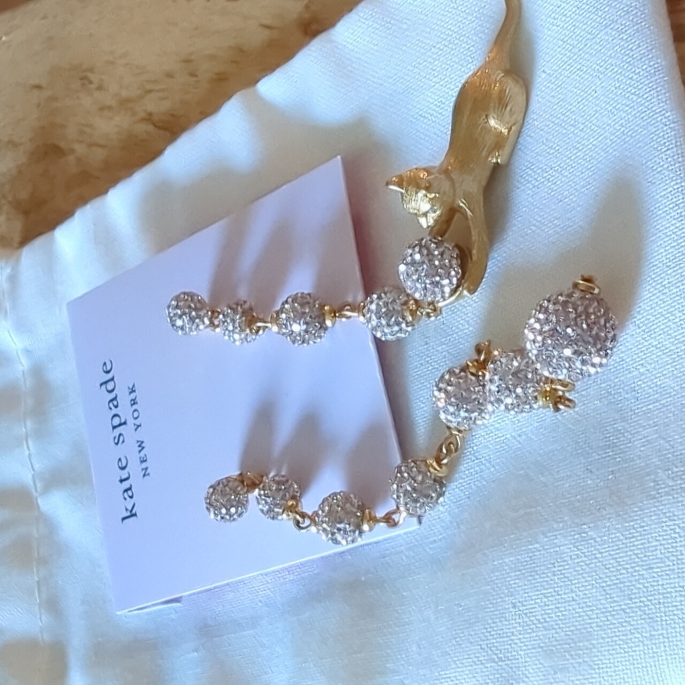 Kate Spade long drop earrings with cat